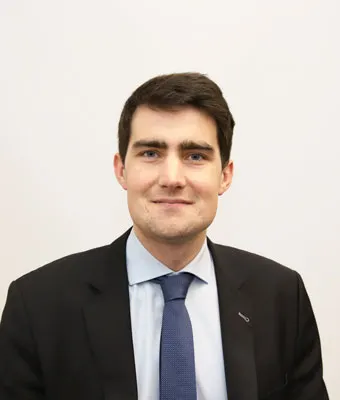 Officieel portret van minister Jack Chambers, die namens de Ierse regering reageert op het loonconflict met de leraren.
